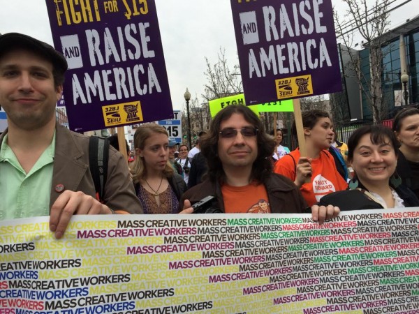Mass. Creative Workers at the April 14th rally for living wages in Boston. Jason Pramas is in the center; Loreto Paz Ansaldo is on the right..